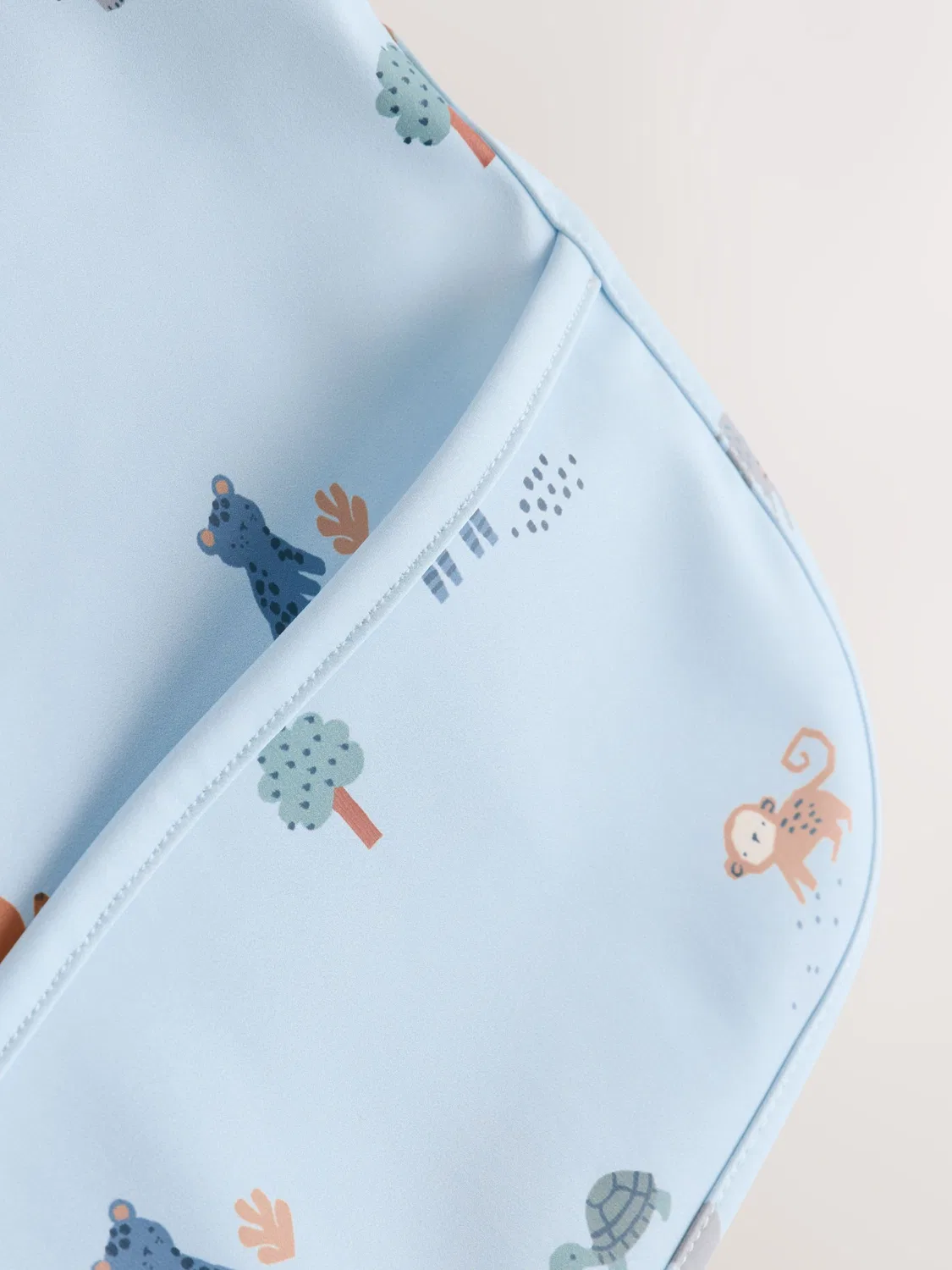 картинка Слюнявчик с рукавами Blue Dino Jungle Next, голубой от магазина Одежда+