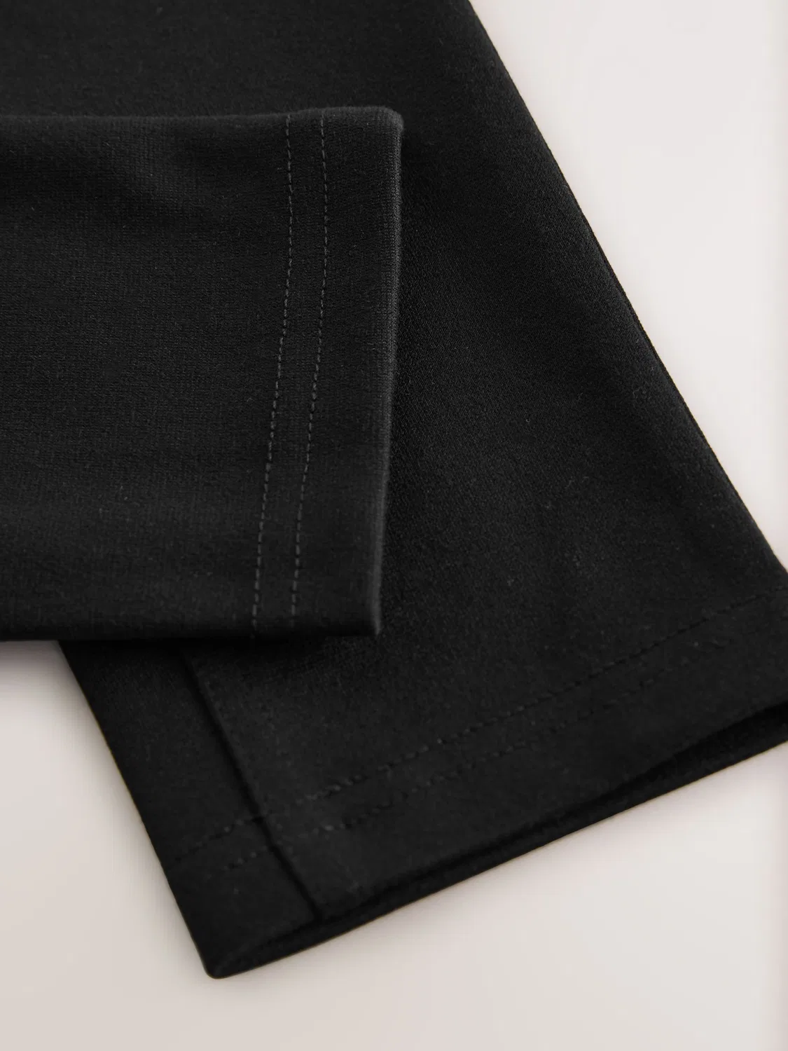 картинка Брюки школьные джерси, укороченные, Black Next от магазина Одежда+