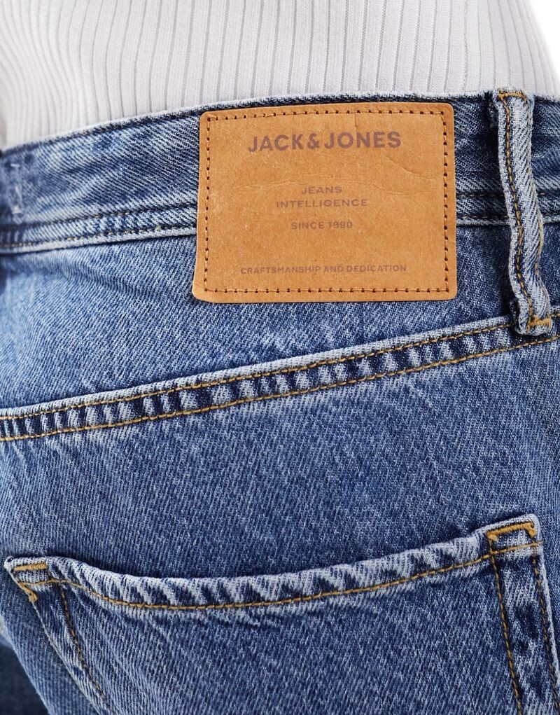 картинка Синие мешковатые джинсы средней потертости Jack & Jones жесткого кроя от магазина Одежда+