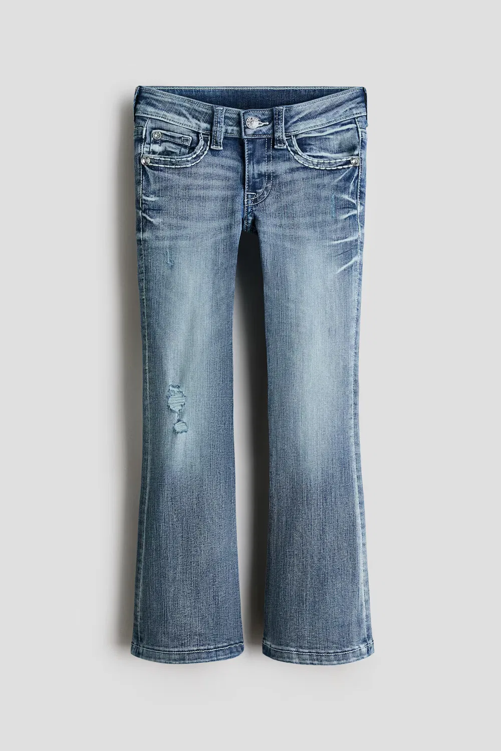 картинка Узкие джинсы-клеш с низкой посадкой H&M, Denimblau от магазина Одежда+