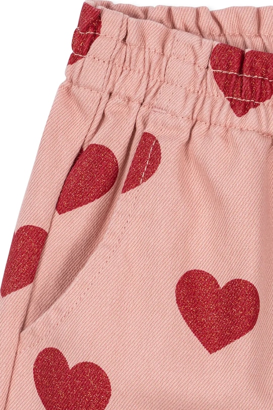 картинка Детские джинсы MAGOT FRILL PANTS GOTS Konges Sløjd, розовый от магазина Одежда+