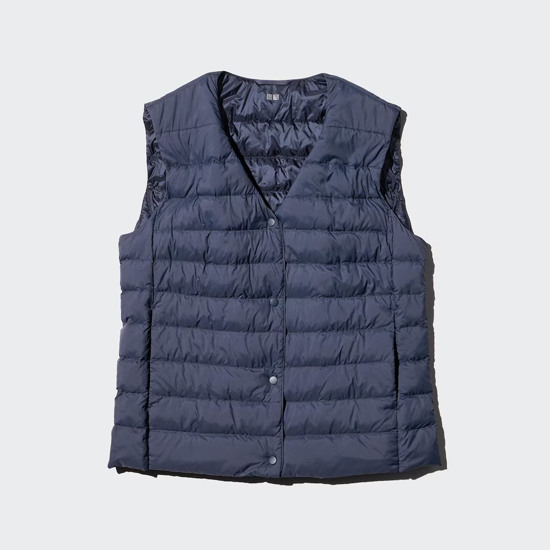 картинка Компактный утеплённый жилет Uniqlo Puffertech, тёмно-синий от магазина Одежда+