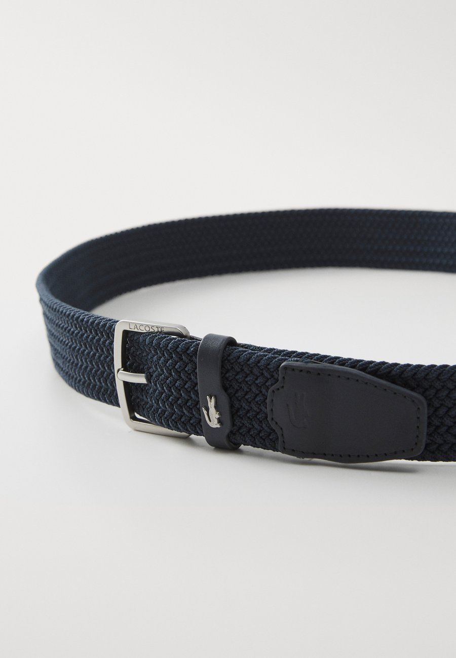 картинка Ремень Lacoste CASUAL, синий от магазина Одежда+