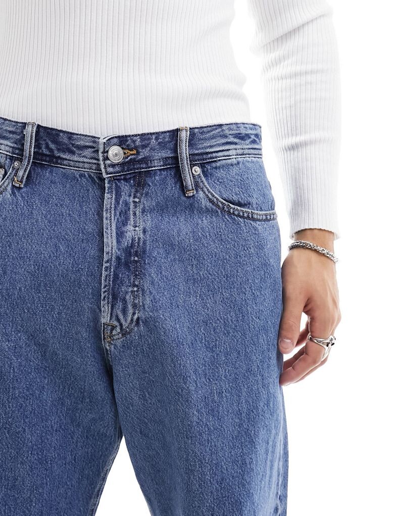 картинка Синие мешковатые джинсы средней потертости Jack & Jones жесткого кроя от магазина Одежда+