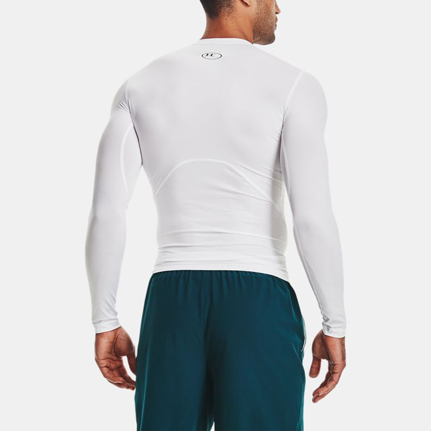картинка Лонгслив Under Armour HeatGear Compression, белый от магазина Одежда+