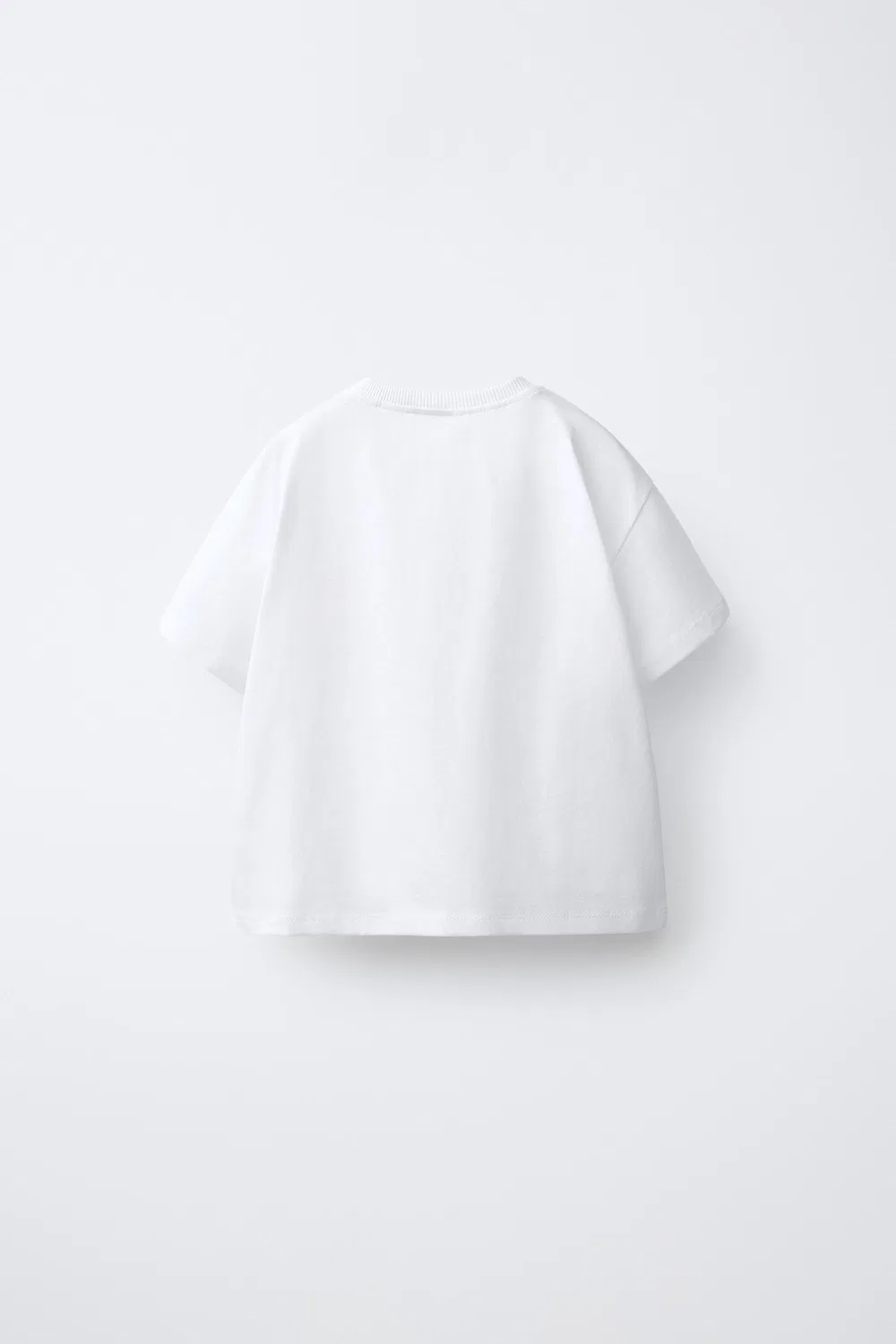 картинка Вязаная крючком футболка с цветочным принтом и карманом ZARA, White от магазина Одежда+