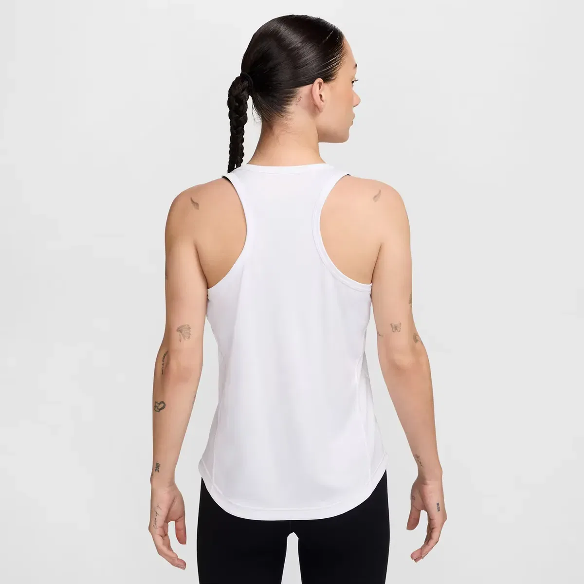 картинка Женский топ для бега Tempo Nike, Blanco от магазина Одежда+