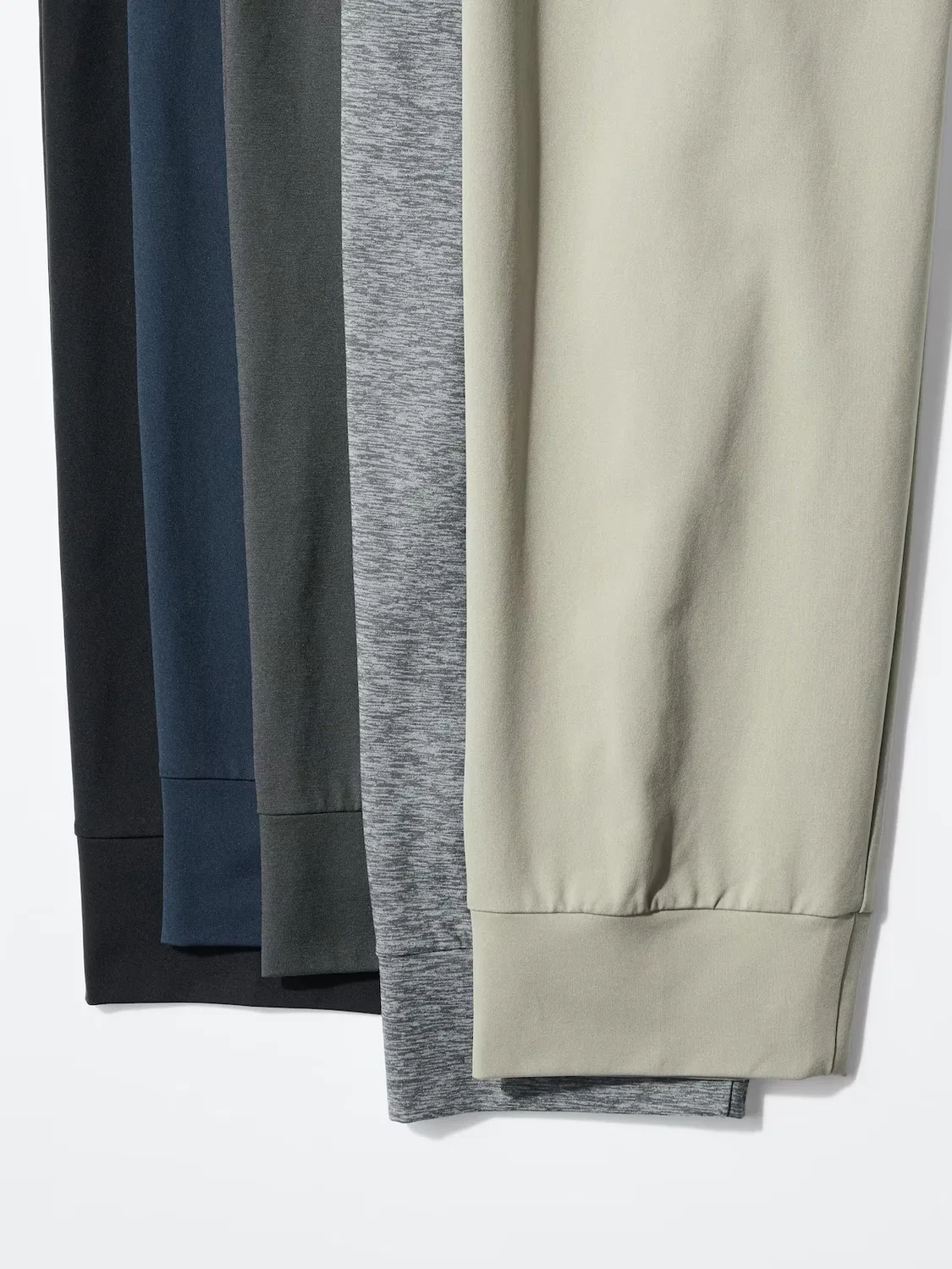 картинка Эластичные спортивные брюки-джоггеры Uniqlo, удлиненный крой, синий от магазина Одежда+