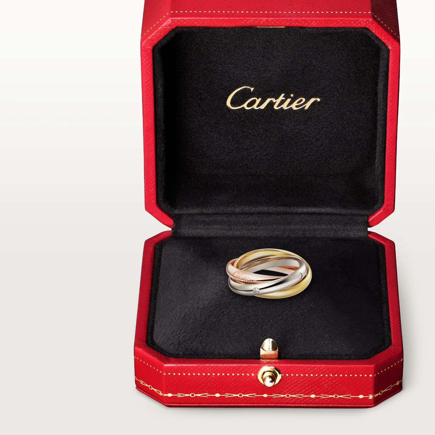 картинка Кольцо Cartier Trinity с бриллиантами из трех видов золота от магазина Одежда+