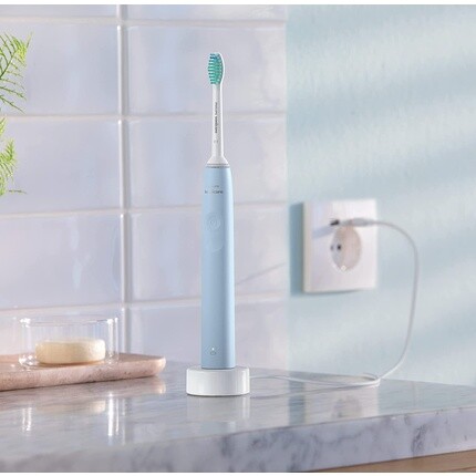 картинка Электрическая зубная щетка Philips Sonicare 2100 Series, голубой от магазина Одежда+