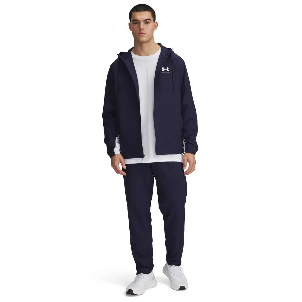 картинка Брюки Under Armour Rival Woven Windbreaker, синий от магазина Одежда+