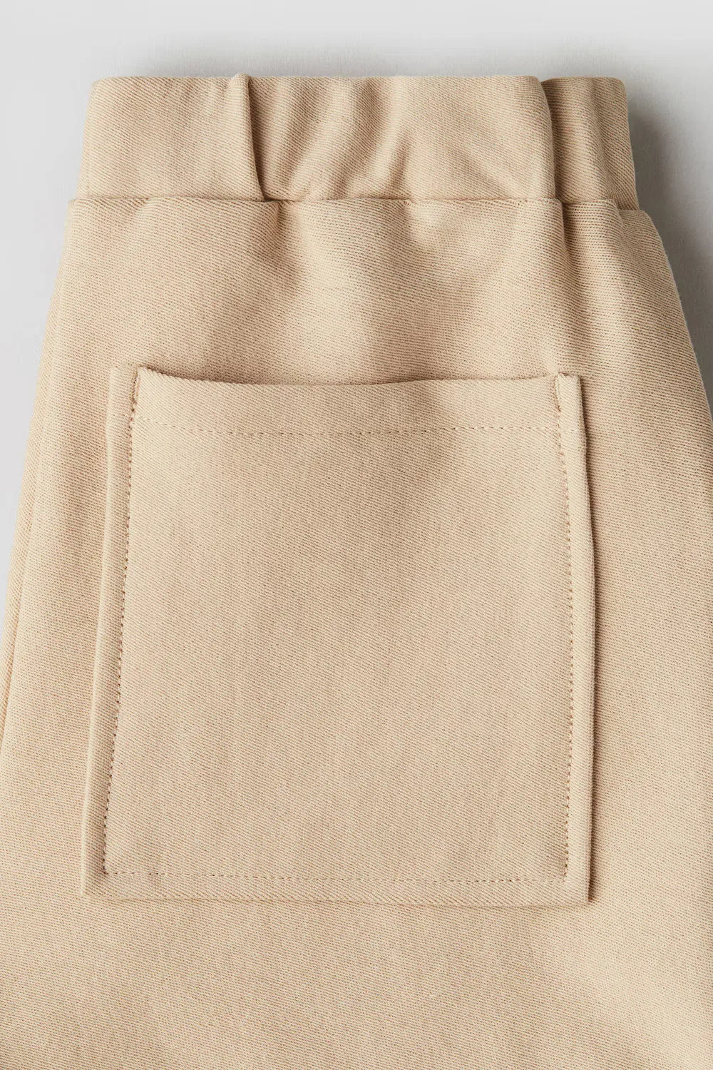 картинка Хлопковые трикотажные шорты свободного кроя H&M, Beige от магазина Одежда+