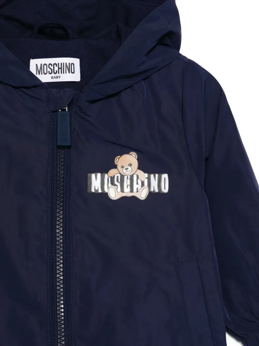 картинка Непромокаемая куртка с капюшоном Moschino Kids, синий от магазина Одежда+