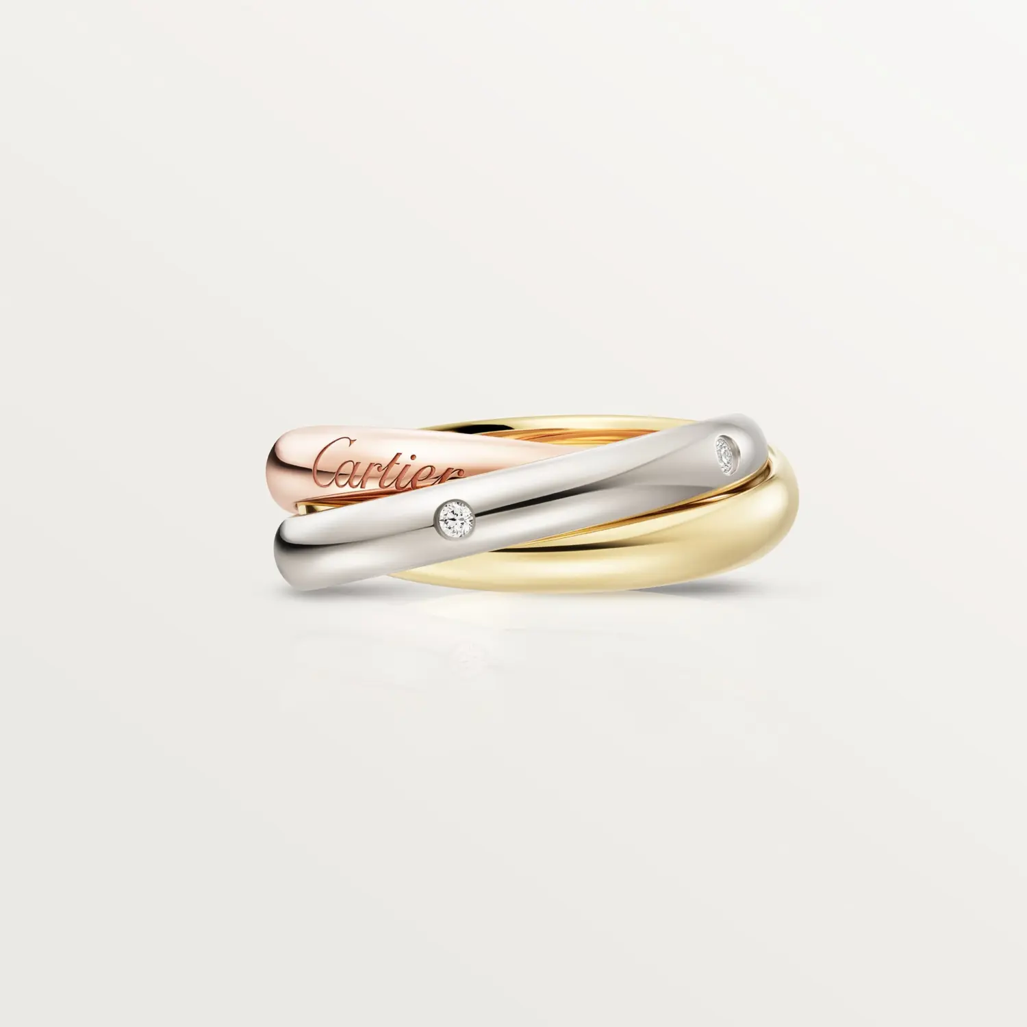 картинка Кольцо Cartier Trinity с бриллиантами из трех видов золота от магазина Одежда+