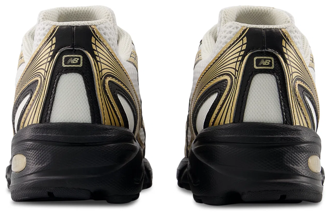 картинка Кроссовки для мальчиков 740 New Balance, цвет White/Gold/Black от магазина Одежда+